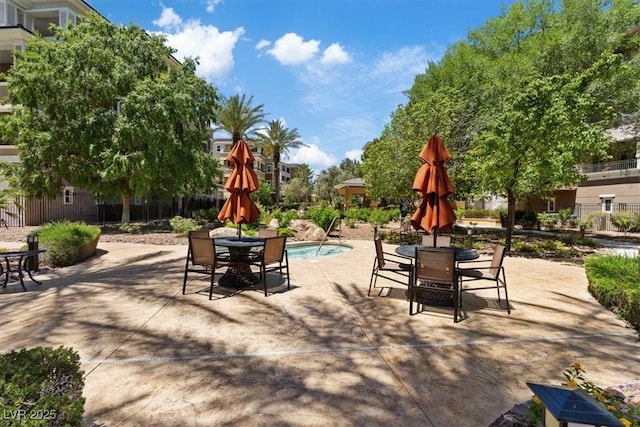 view of patio / terrace with a swimming pool