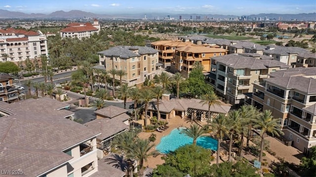 birds eye view of property featuring a mountain view