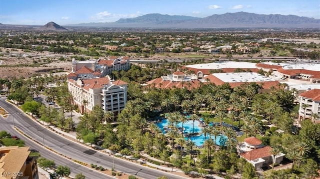 birds eye view of property featuring a mountain view