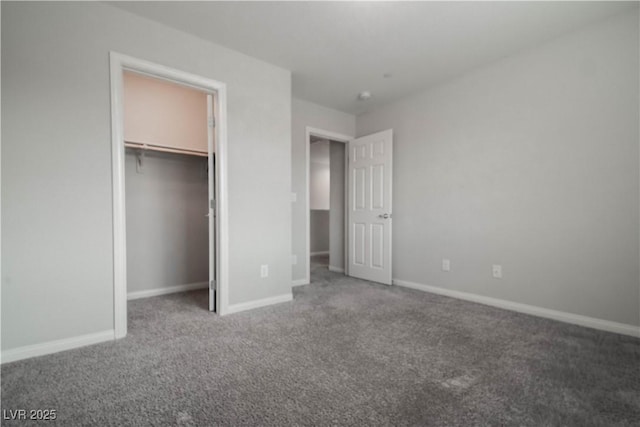 unfurnished bedroom featuring a closet and carpet flooring