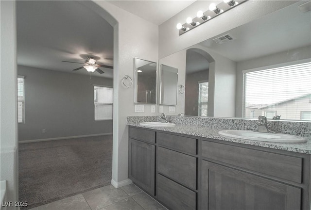 bathroom with vanity, tile patterned flooring, and ceiling fan