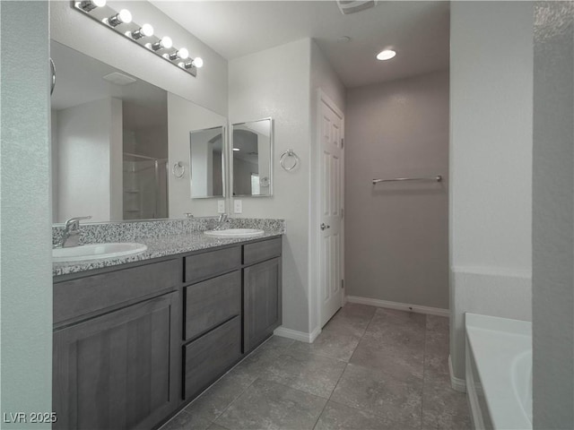 bathroom featuring vanity and a bathtub