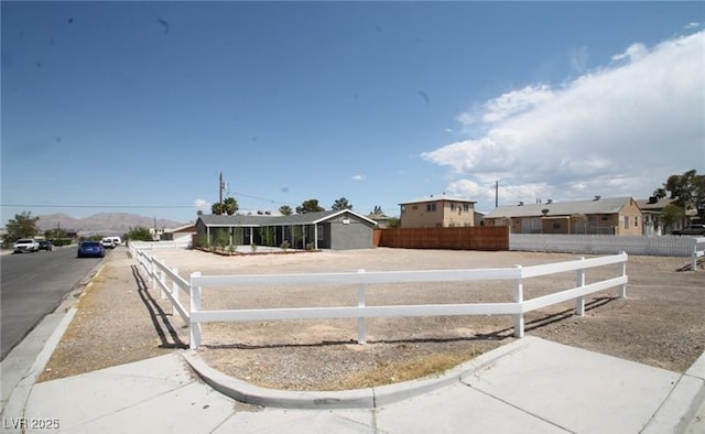 view of front facade with fence