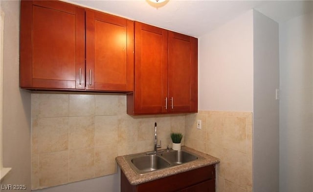 kitchen featuring light countertops and a sink