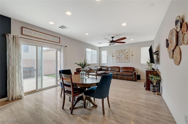 dining room featuring ceiling fan and light wood-type flooring