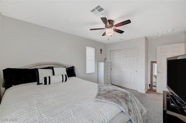 bedroom featuring ceiling fan, carpet floors, and a closet