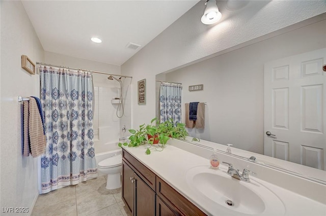 full bathroom featuring tile patterned flooring, vanity, toilet, and shower / bath combo with shower curtain