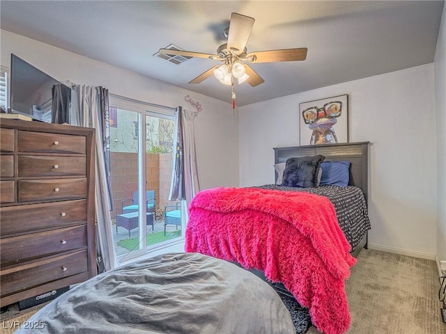 bedroom with access to exterior, light colored carpet, and ceiling fan