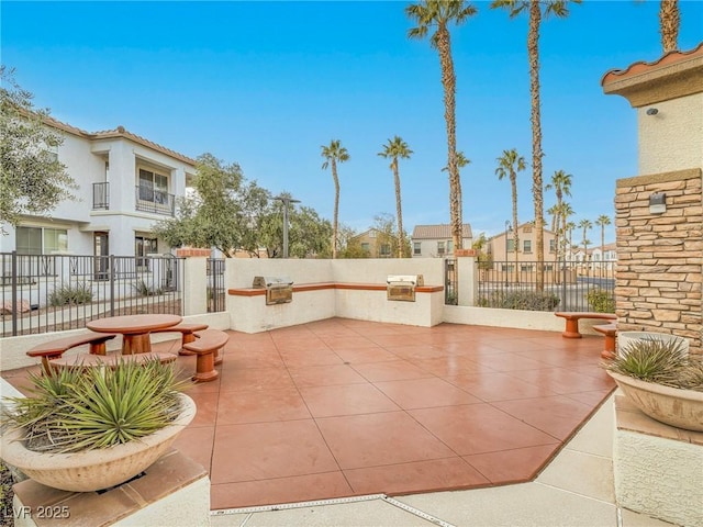 view of patio / terrace featuring a grill and exterior kitchen