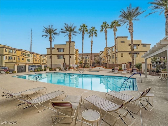 view of swimming pool featuring a patio area