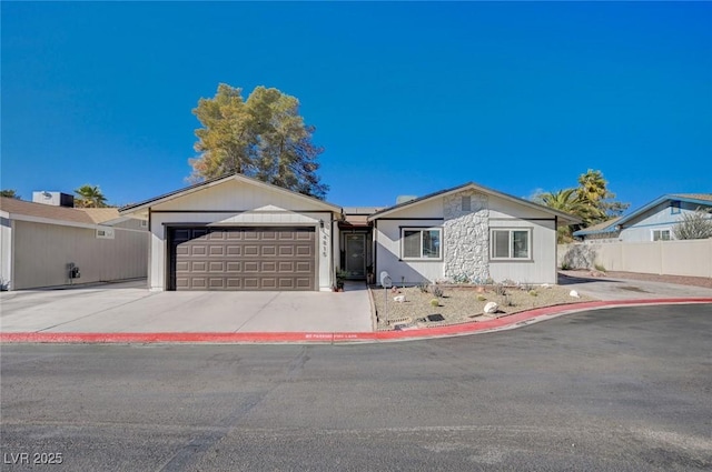 ranch-style home featuring a garage