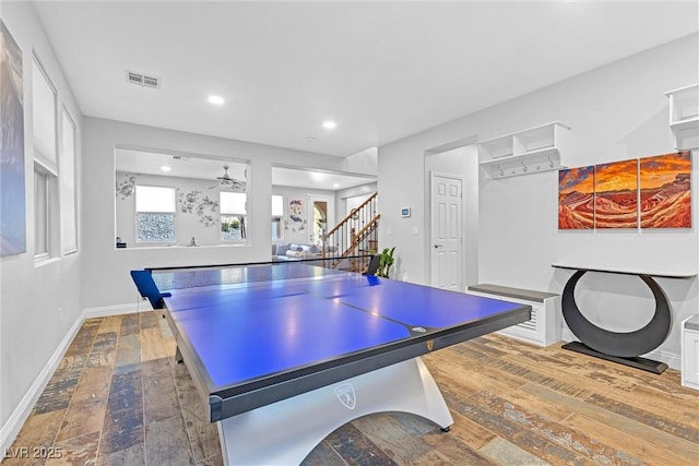 game room with hardwood / wood-style floors