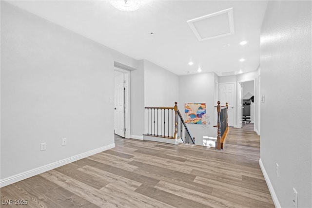 spare room featuring light hardwood / wood-style floors