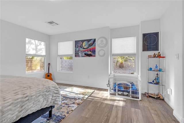 bedroom featuring light wood-type flooring