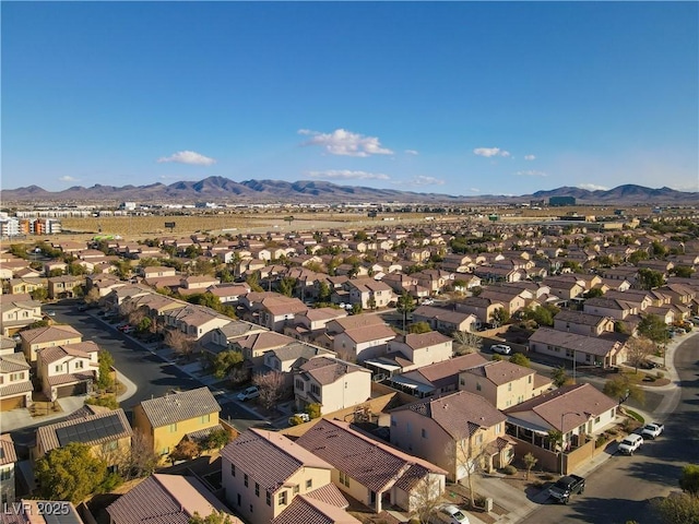 bird's eye view with a mountain view