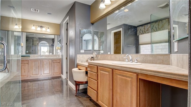 bathroom with vanity and plus walk in shower