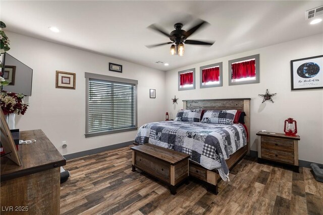 bedroom featuring dark wood-type flooring and ceiling fan