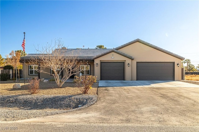 single story home with a garage