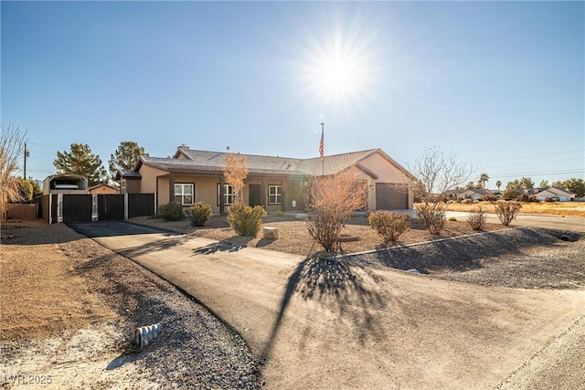 single story home featuring a garage