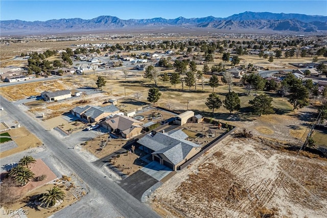 bird's eye view with a mountain view