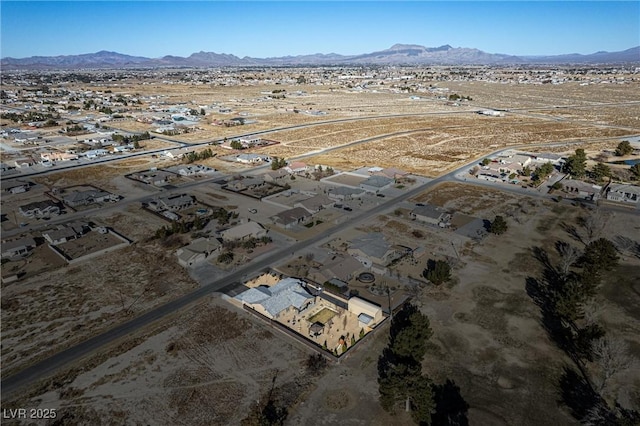 bird's eye view with a mountain view