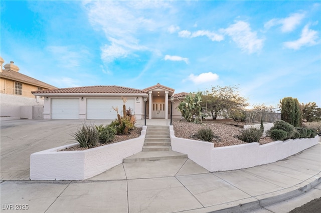 view of front of property with a garage