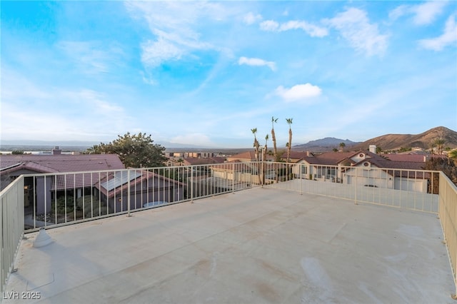 view of patio / terrace featuring a mountain view