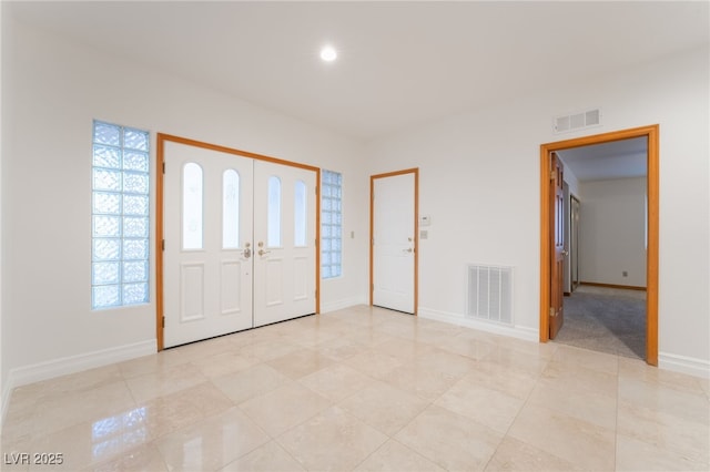 entrance foyer featuring a wealth of natural light