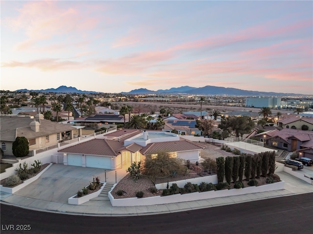 aerial view at dusk with a mountain view