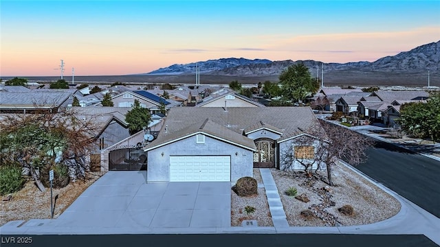 aerial view at dusk with a mountain view