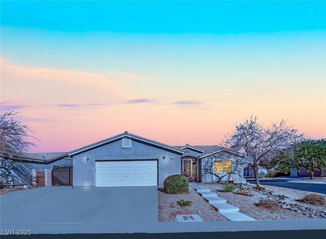 single story home featuring a garage