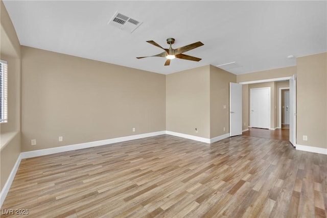 unfurnished room featuring ceiling fan and light wood-type flooring