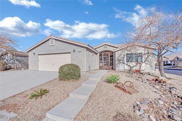 ranch-style home featuring a garage