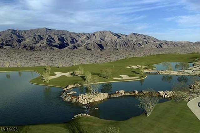 view of home's community with a water and mountain view