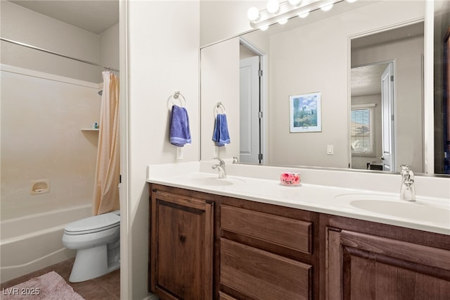 full bathroom featuring shower / bath combination with curtain, vanity, toilet, and tile patterned flooring