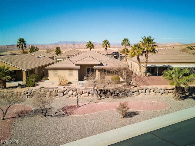 view of front of house with a mountain view