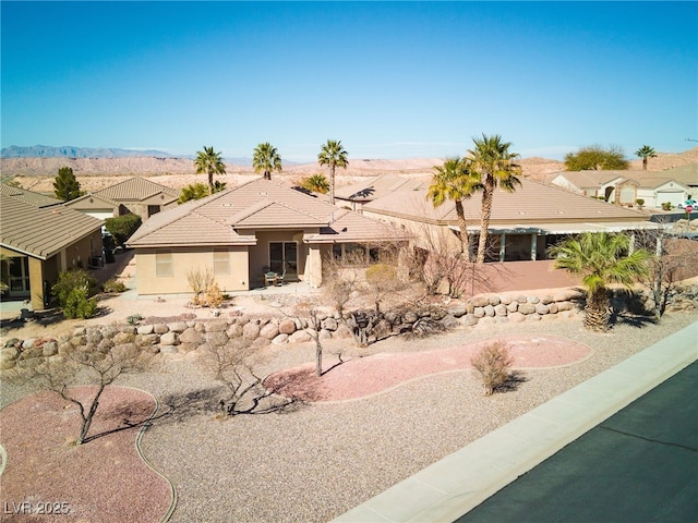 view of front of home with a mountain view