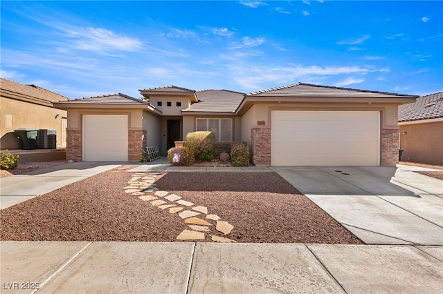 prairie-style house featuring a garage