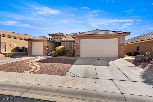 prairie-style home featuring a garage