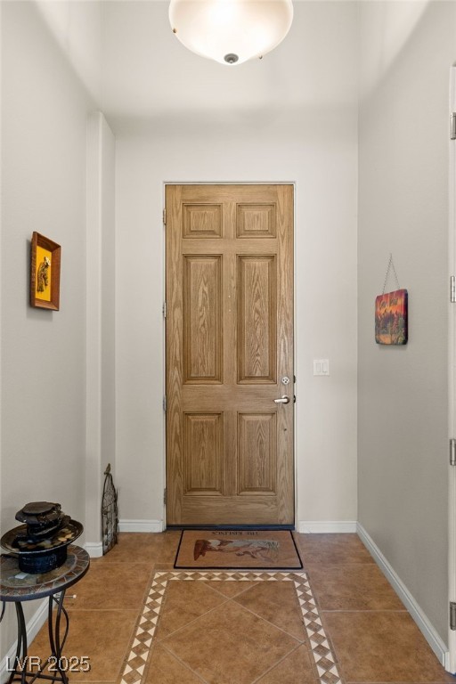 entrance foyer with tile patterned floors