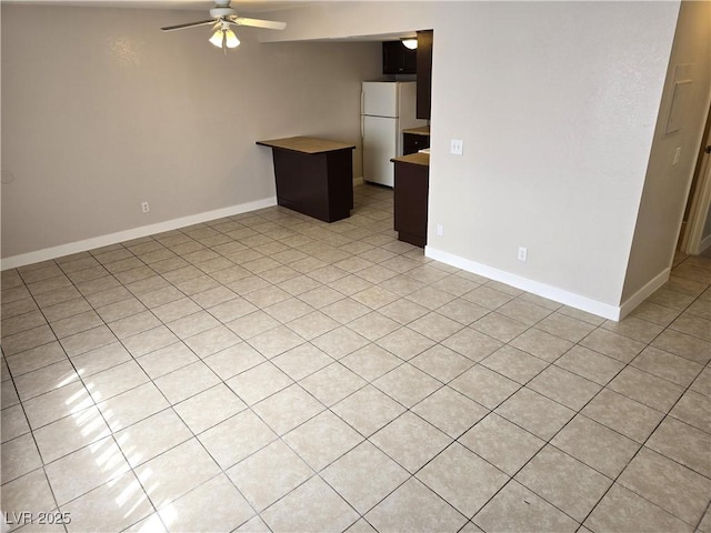 interior space featuring ceiling fan