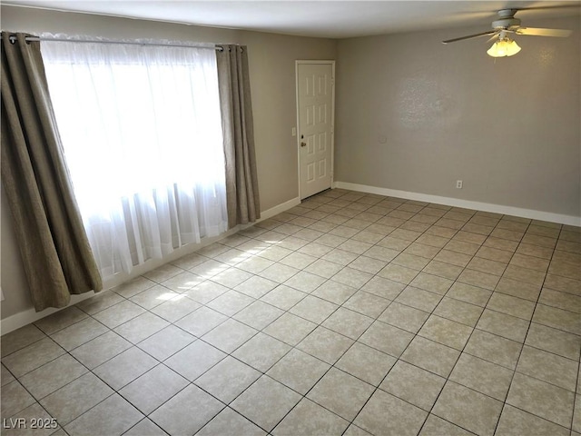 unfurnished room with ceiling fan