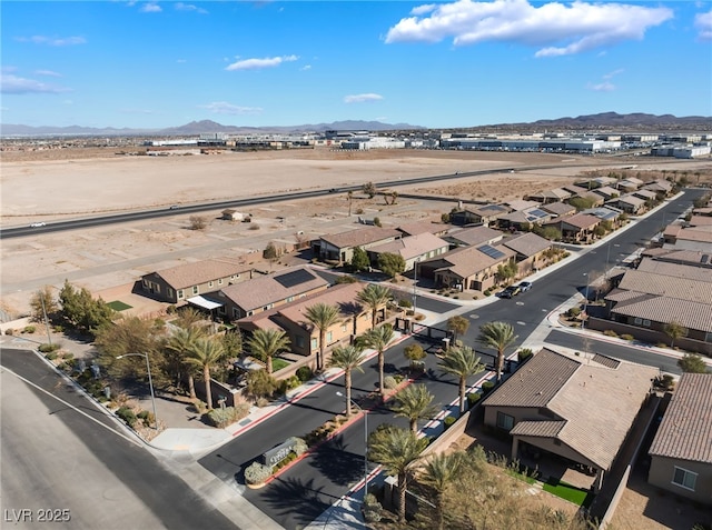 drone / aerial view featuring a mountain view