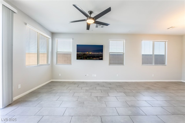 empty room featuring ceiling fan