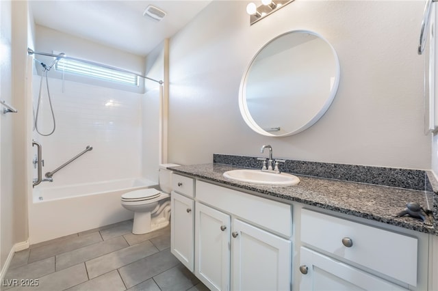 full bathroom featuring vanity, tile patterned floors, washtub / shower combination, and toilet