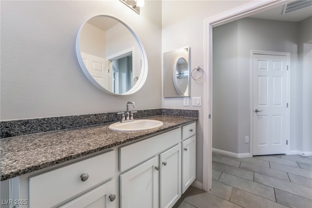 bathroom featuring vanity and tile patterned floors