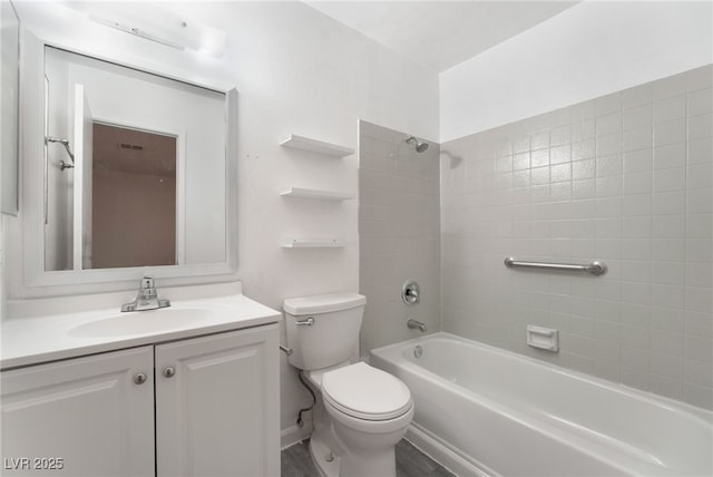 full bathroom featuring vanity, bathtub / shower combination, and toilet