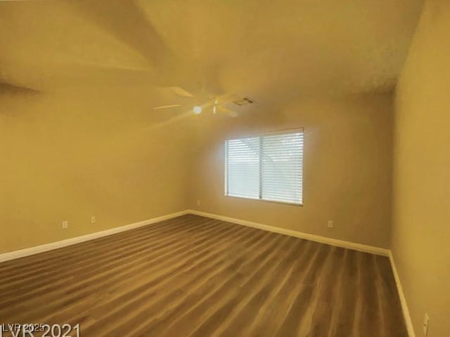 empty room featuring hardwood / wood-style floors