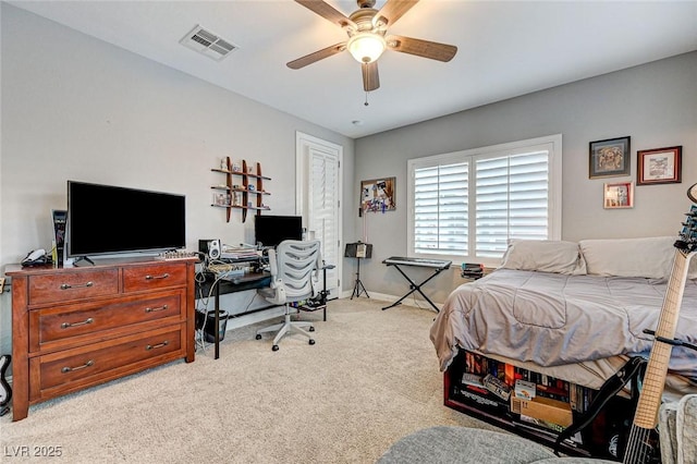 carpeted bedroom featuring ceiling fan