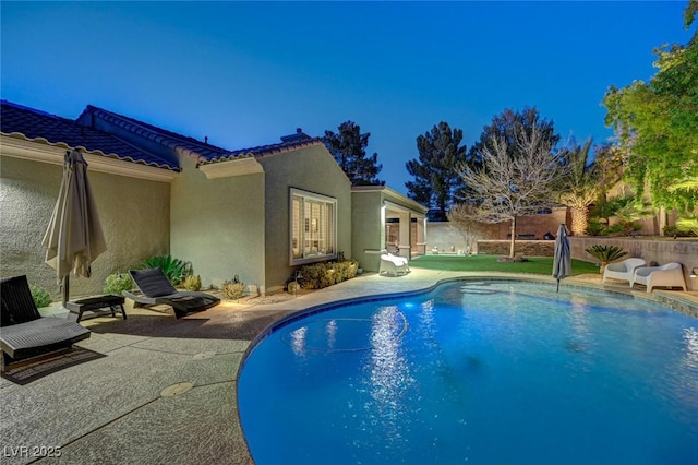 view of pool featuring a patio